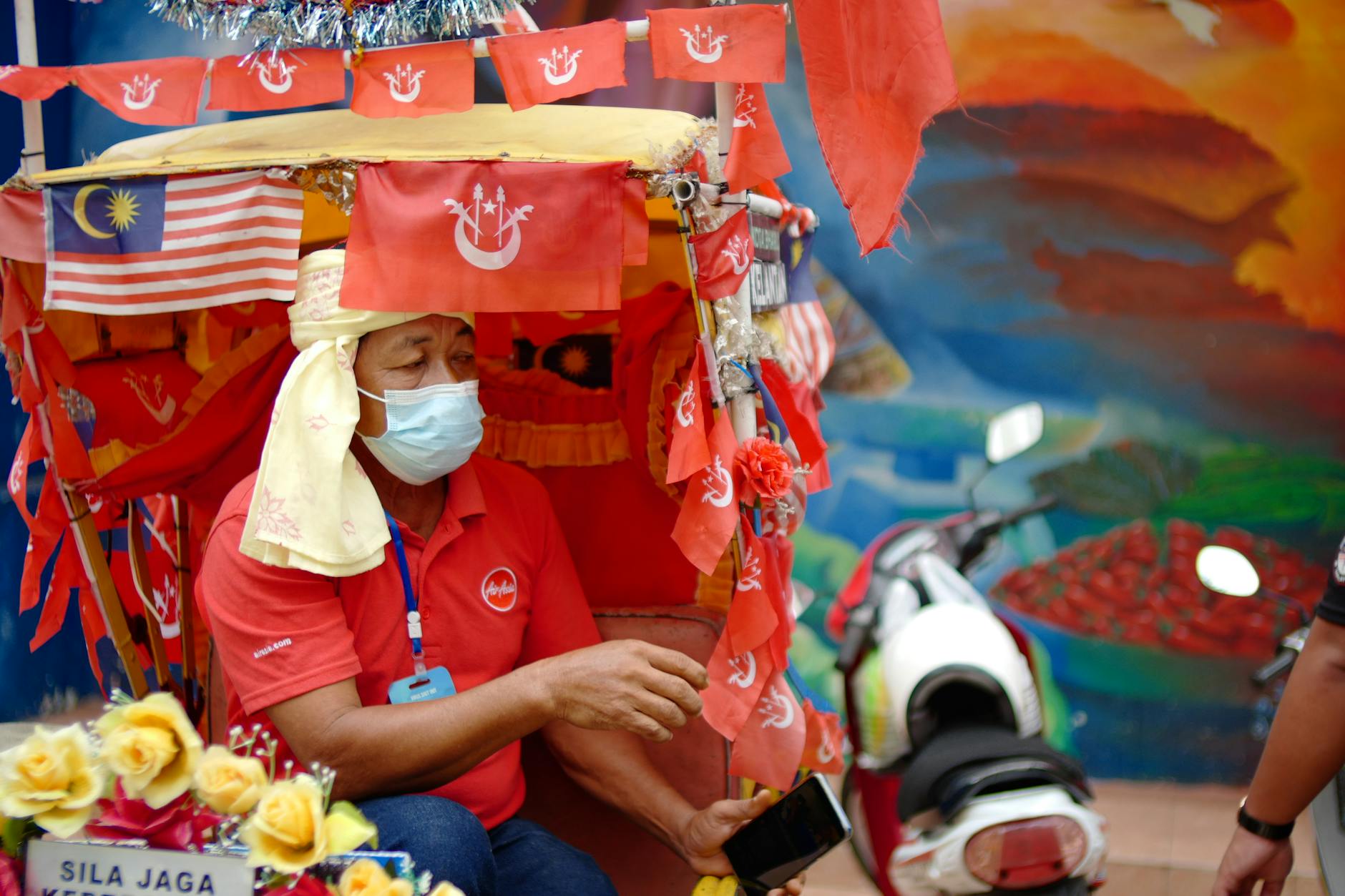 man on a street market in malaysia