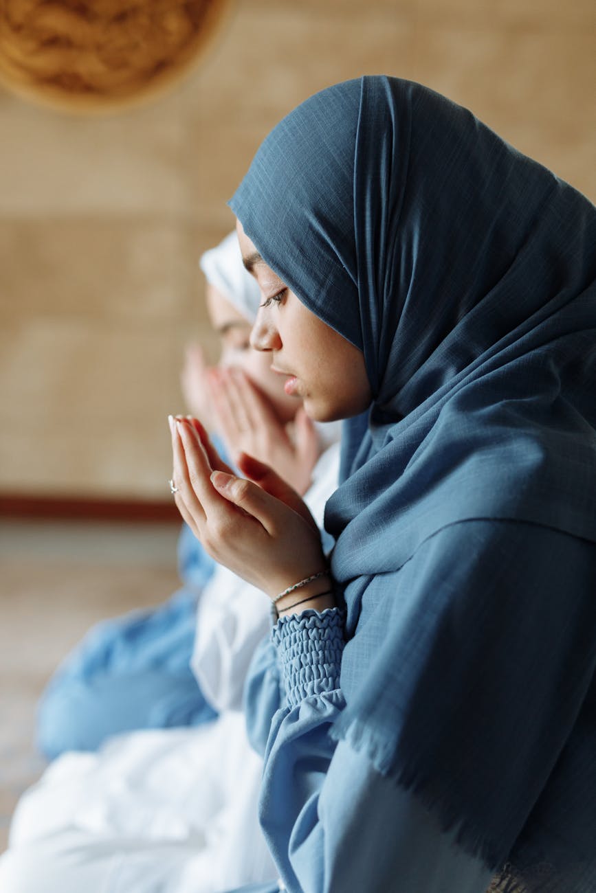 a woman in blue hijab